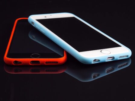 two phones in colorful cases
